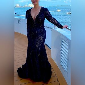 Black beaded dress with a tail. Length cut for me. I’m 5’3 but wore 4 in heels.